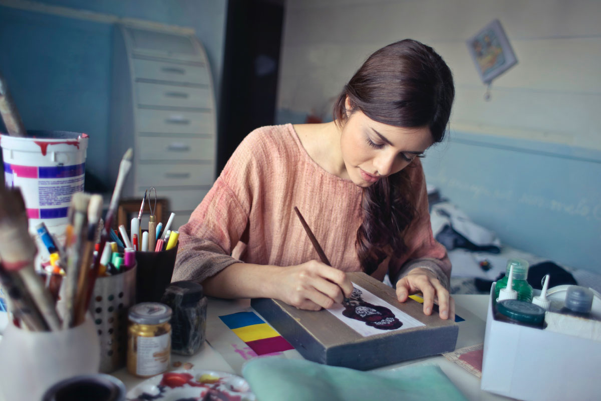 Young woman painting